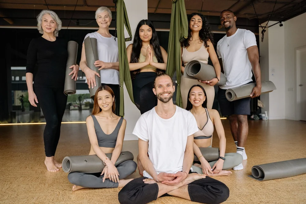 Students practicing together in a yoga studio